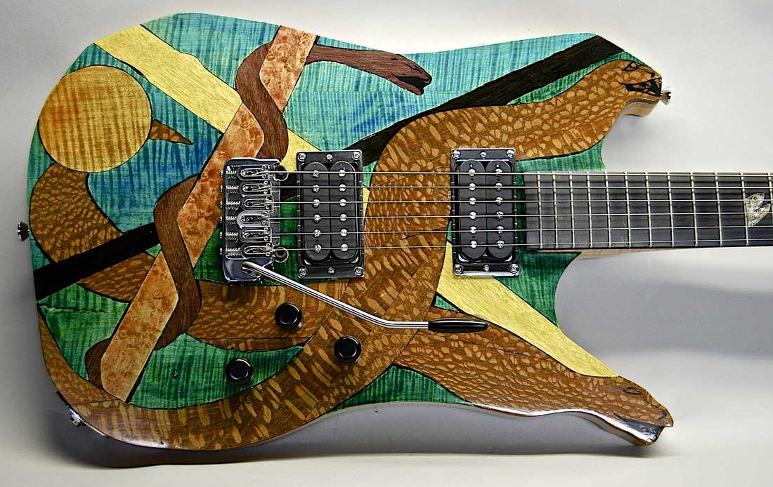 button - photo links to page about art guitar called The Flat Snakes