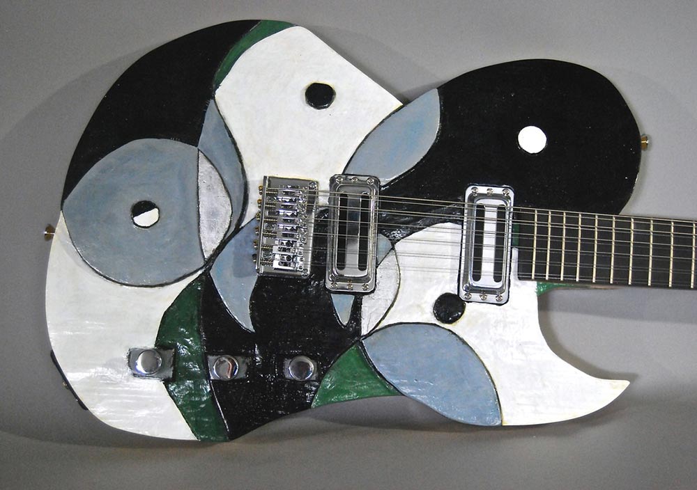 button - photo of yin-yang guitar that links to more info