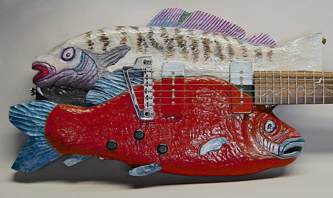 button - photo link of art guitar that is two fish