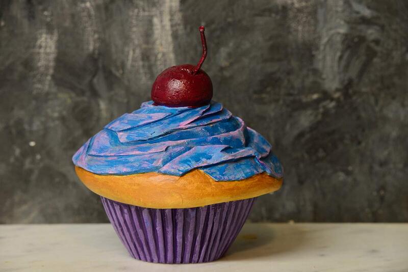 photo of wood artwork that looks like a cupcake