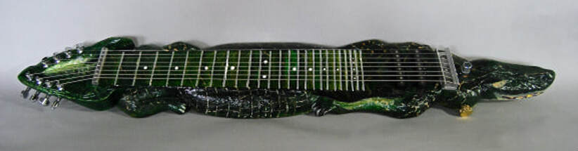 photo of whole alligator lap steel from above