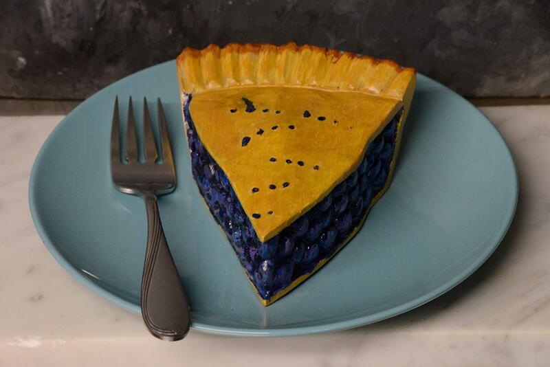 photo of wood artwork that looks like blueberry pie