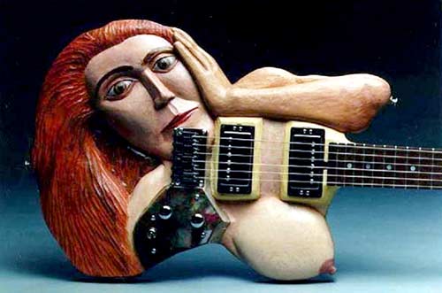 photo of Mona guitar to accompany poem