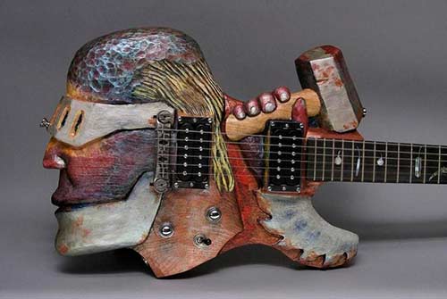 photo of Cyborgian (Chrome Dome) guitar to accompany poem